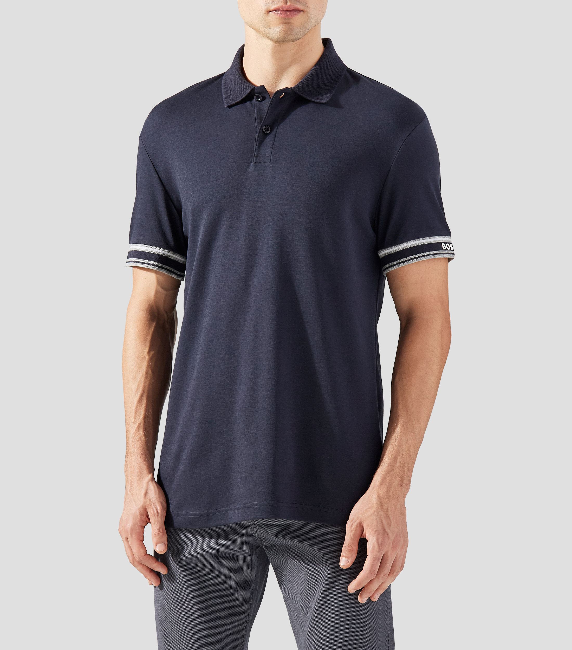 Playera tipo Polo slim fit de algodón con puños a rayas Hombre